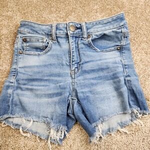 American Eagle Hi-Rise Shortie Denim Shorts Size 4 Med Wash Raw Hem Ne(x)t Level